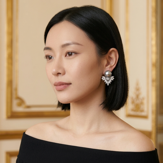 Model wearing the Éventail Jacket Earrings, silver-tone brass, simulated grey pearls, simulated diamonds