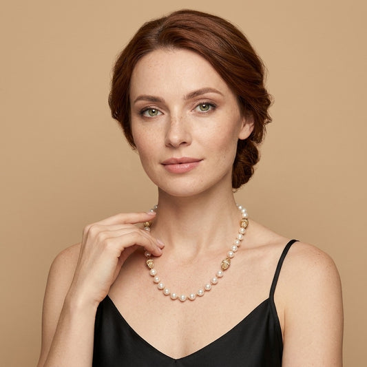 Model wearing the Filigrane Necklace, cultured freshwater pearls, gold-tone sterling silver