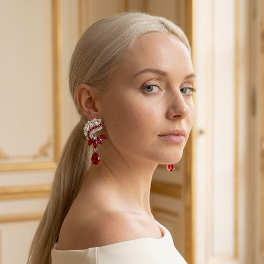 Model wearing the Flamme Drop Earrings, silver-tone brass, simulated rubies, simulated diamonds