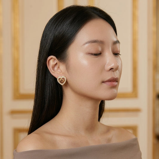Model wearing the Billet Doux Stud Earrings, gold-tone brass, simulated diamonds