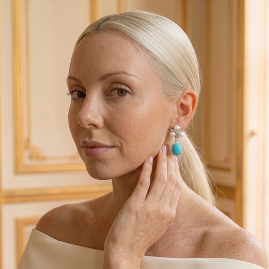 Model wearing the Capri Drop Earrings, silver-tone brass, simulated turquoise, simulated pearls, simulated diamonds