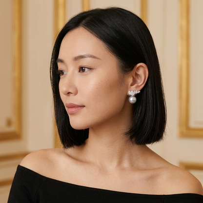 Model wearing the Couronne Stud Earrings, silver-tone brass, simulated pearls, simulated diamonds