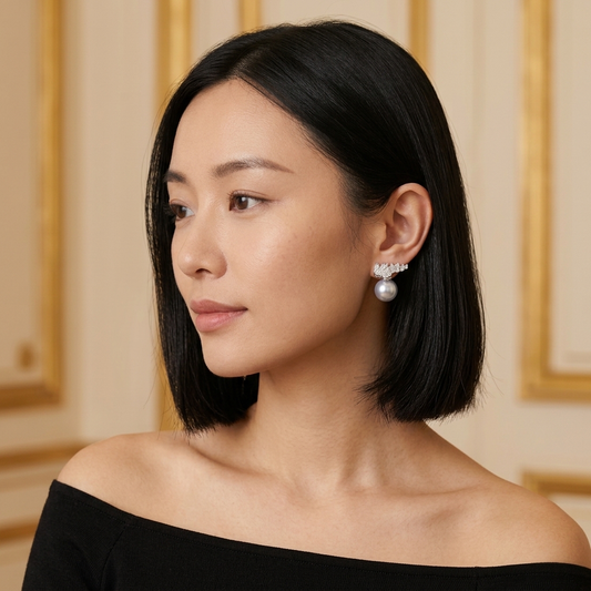Model wearing the Couronne Stud Earrings, silver-tone brass, simulated pearls, simulated diamonds