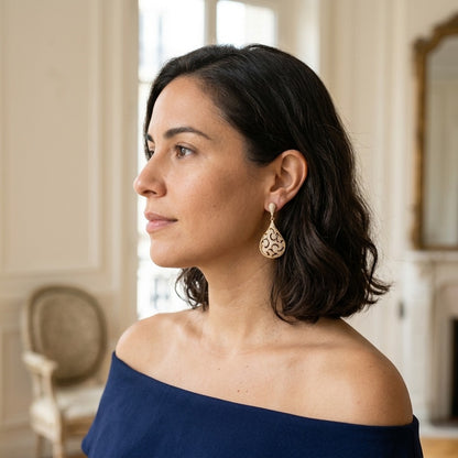 Model wearing the Dentelle Teardrop Earrings, gold-tone brass, simulated diamonds