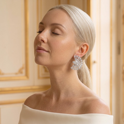 Model wearing the Éventail Stud Earrings, silver-tone brass, simulated diamonds