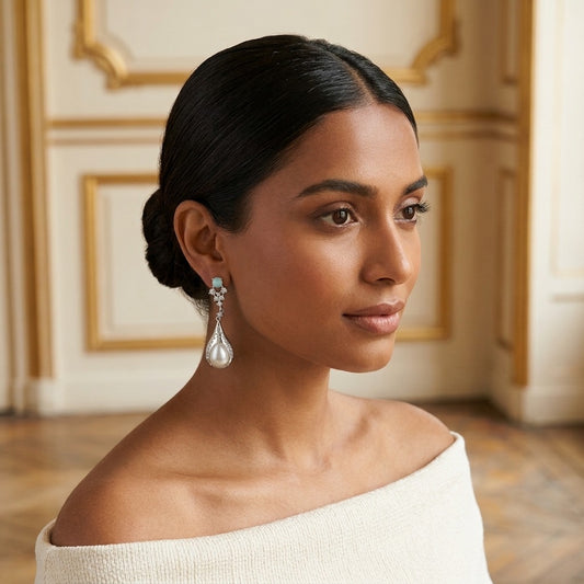 Model wearing the Larme Drop Earrings, silver-tone brass, simulated chalcedony, simulated pearls, simulated diamonds