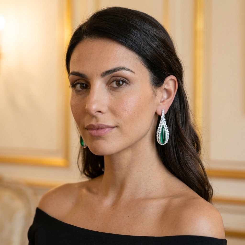 Model wearing the Larme Long Drop Earrings, silver-tone brass, green cabochons, simulated diamonds