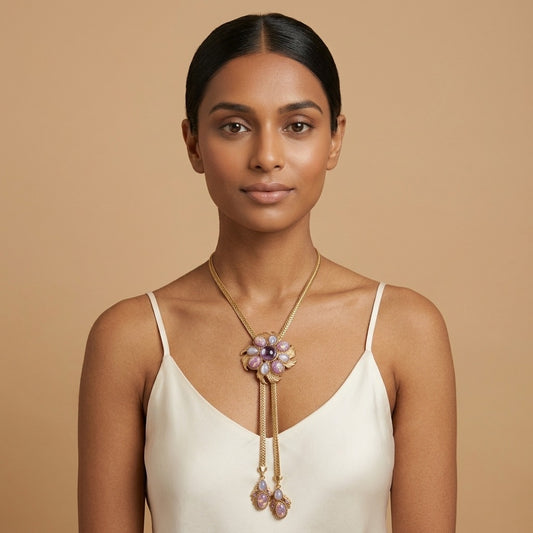 Model wearing the Lilas Lariat Necklace, gold-tone brass, lilac cabochons