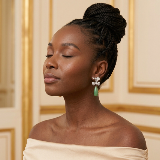 Model wearing the Nœud Teardrop Earrings, silver-tone brass, simulated jade, simulated diamonds