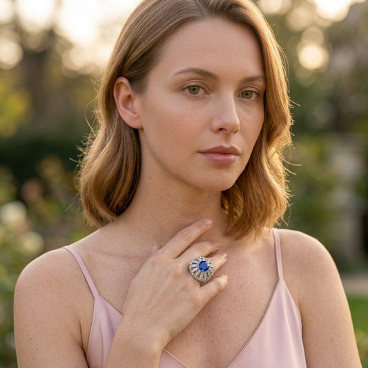 Model wearing the Ombrelle Ring, silver-tone brass, simulated sapphire, simulated diamonds