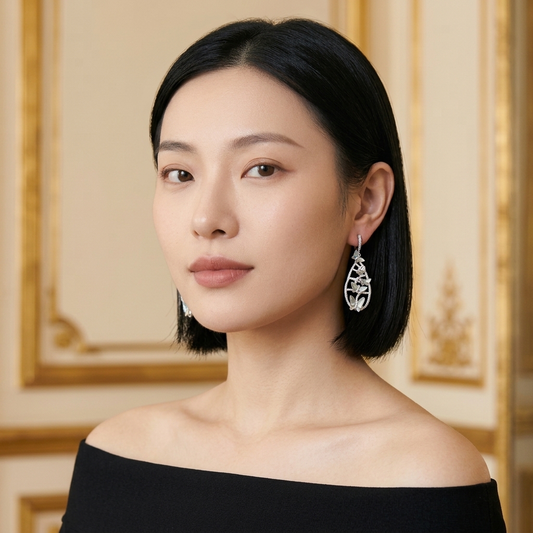 Model wearing the Papillon Drop Earrings, silver-tone brass, iridescent inlay, simulated diamonds