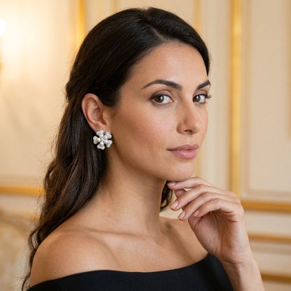 Model wearing the Pensée Stud Earrings, silver-tone brass, simulated pearls, simulated diamonds