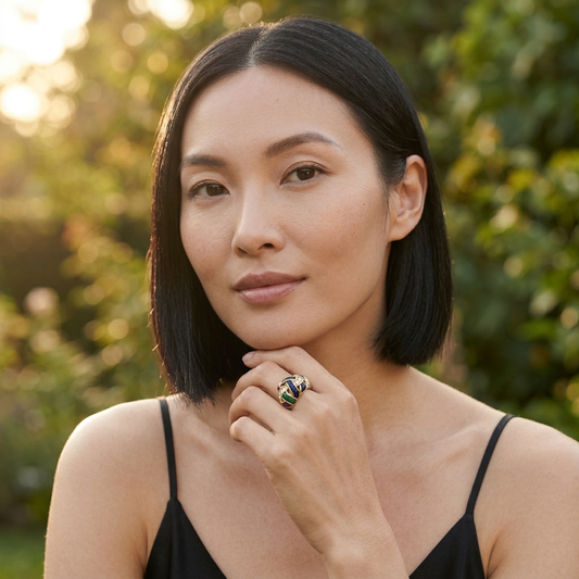 Model wearing the Tressé Dome Ring, gold-tone brass, multicolored enamel, simulated diamonds