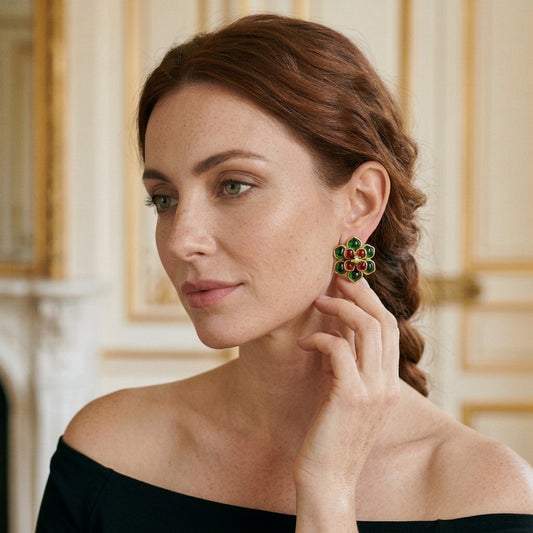 Model wearing the Vitrail Flower Earrings, gold-tone brass, green and red cabochons